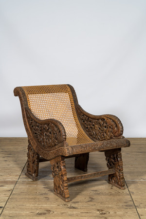 An oak wooden open worked colonial armchair with 'cannage', 19/20th C.