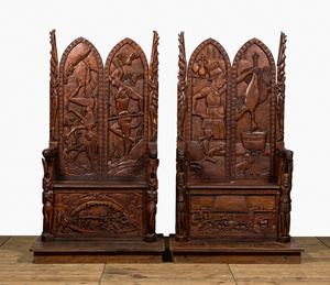 A pair of imposing wooden throne seats with relief design, 20th C.