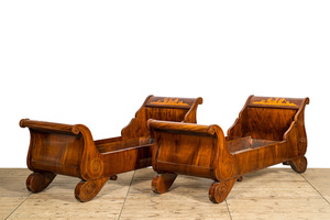 A pair of French mahogany beds or 'lits en bateau', 19th C.