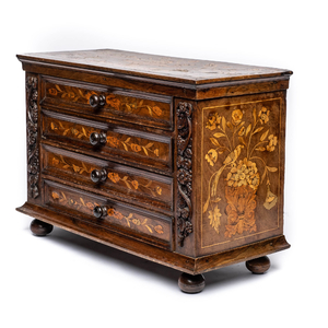 A four-drawer table cabinet with floral marquetry, probably The Netherlands, 18/19th C.