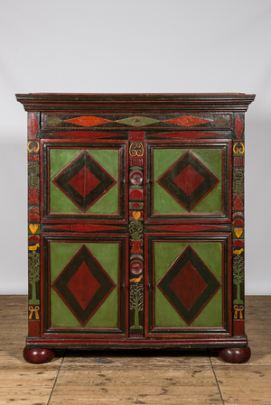 A polychrome wooden four-door cupboard, Alsace, 1st half 19th C.