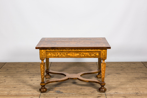 A Dutch veneered wooden table with floral marquetry, 19th C.