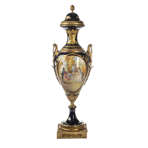 A massive Sèvres-style porcelain lidded vase with gilt bronze mounts, signed Nezini, early 20th C.