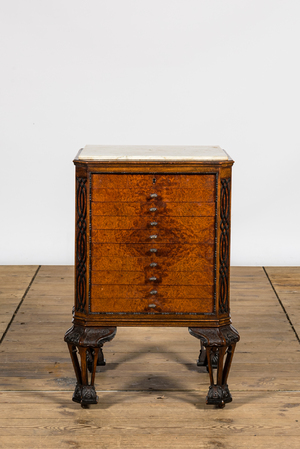 A burl wood veneered coin cabinet with marble top, 20th C.