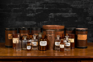 A varied collection of pharmacists' bottles and jars, 19/20th C.