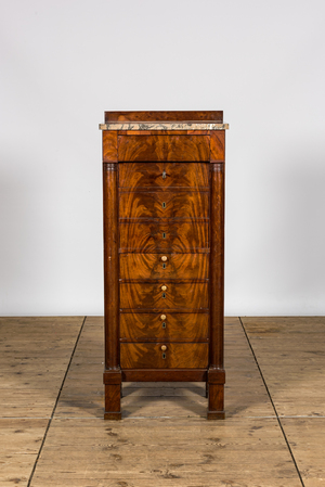 A mahogany 'semainier' with marble top, 19th C.