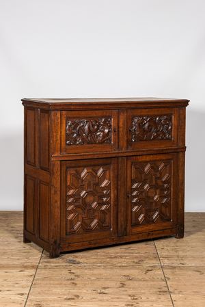 A Flemish oak wooden four-door cupboard with seahorses, 17th C. and later