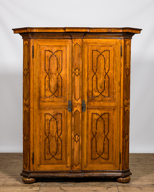 A German walnut veneered two-door marquetry cupboard, 18th C.