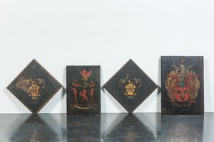 Four painted wooden armorial panels, 18th C.