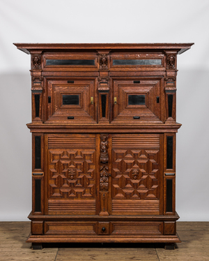A Flemish oak wooden four-door cupboard, 17th C. and later