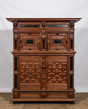 A Flemish oak wooden four-door cupboard, 17th C. and later