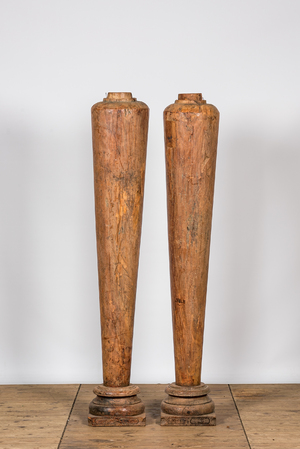 A pair of teak wooden columns on foot, Kerala, India, 19/20th C.