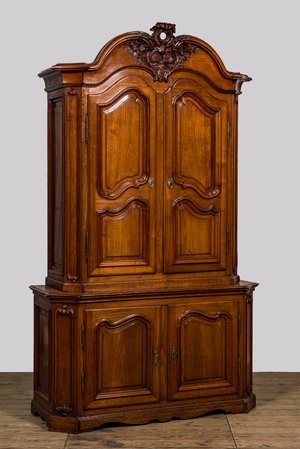 A French Louis XV-style cherry wooden 'deux corps', 18th C.