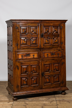 An English Jacobean-style four-door cabinet, 19th C.