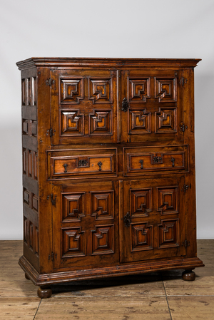 An English Jacobean-style four-door cabinet, 19th C.