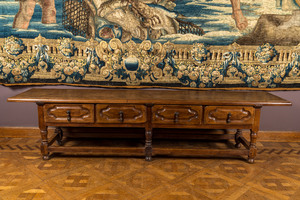 A walnut console table with four drawers, 19th C. with older elements