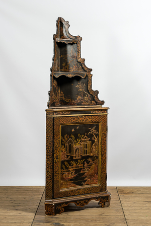A black-lacquered and gilt chinoiserie corner cabinet, 20th C.