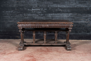 A French walnut table in Henri II-style