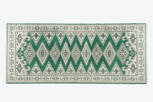 An Oriental rug with geometric motifs, wool on cotton, 20th C.