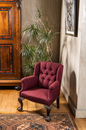 An English walnut armchair, 19th C.