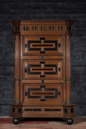 A Dutch partly ebonised oak cupboard with columns, 17th C. with later elements