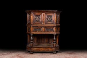 A walnut 'credence' case with portrait medallions, probably France, late 17th C. with later elements