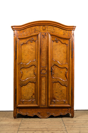 A French Louis XV-style two-door wardrobe with burl wood veneer, 18th C.