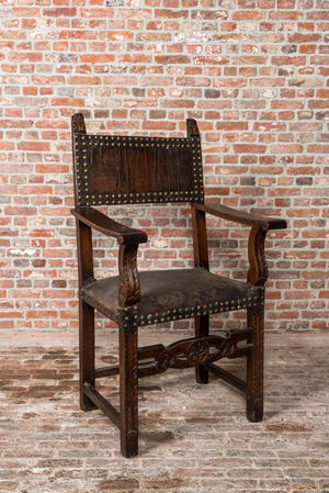 A Spanish walnut chair with leather upholstery, 17th C.