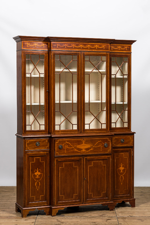 An English neoclassical mahogany marquetry breakfront bookcase, 19/20th C.