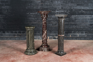 Two marble stands and one faux-marble-painted wooden stand, 19/20th C.