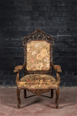 A Black Forest wooden armchair with acorns and oak leafs, 19th C.