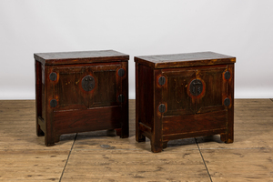 A pair of Chinese lacquered elm cabinets, 20th C.