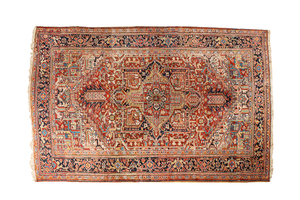 A large rectangular ornamental Heriz rug, 19/20th C.