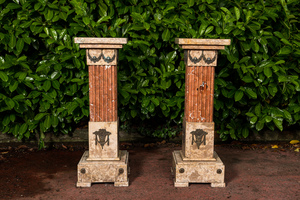 A pair of neoclassical marble stands with bronze mounts, 19/20th C.