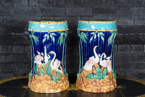 A pair of polychrome glazed jardinière stands with flamingos, 20th C.