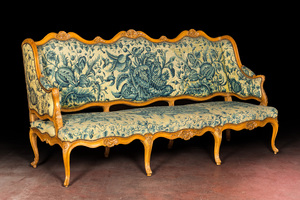 A large French Louis XV beechwooden sofa with embroidered upholstery, 18th C.