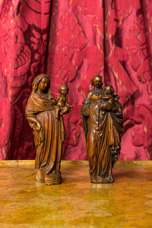 Two Flemish boxwood and walnut figures of the Virgin with Child, 17th C.