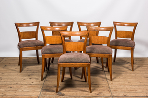 Seven oak wooden dining room chairs, 1st half 20th C.