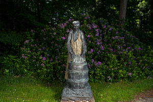 Jan Dekker: 'Fisherman smoking a cigar', a life size patinated bronze sculpture