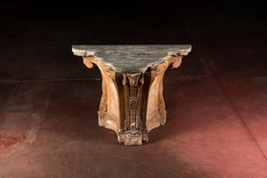 A patinated plaster console with patinated wooden top, 20th C.