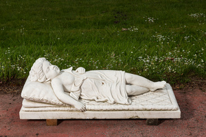 A white marble funerary monument with a sleeping young lady, 20th C.