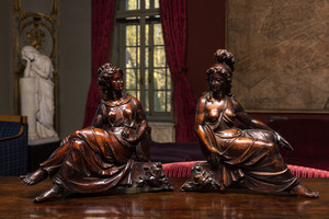 A pair of walnut sculptures of Greek goddesses, 18th C.