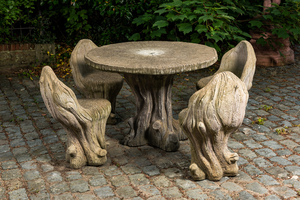 A concrete garden set in the shape of tree trunks, 20th C.