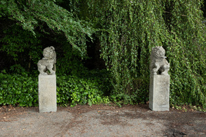 A pair of Chinese Ming-style basalt stone sculptures, 19/20th C.