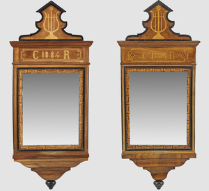 A pair of large French partly ebonised walnut mirrors with various woods inlaid, dated 1884