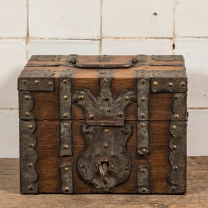 A wrought iron-mounted wooden box, 19th C.