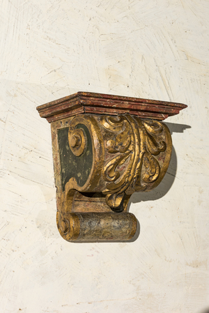 A gilt and polychromed wooden wall console, 19th C.