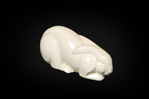 A white crackle-glazed faience Art Deco model of a hare or rabbit, Ch. Lemanceau for Saint-Clement, ca. 1930