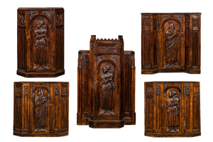 Five richly carved Gothic Revival oak single-door cupboards 19/20th C.