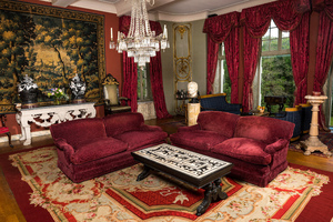 A pair of two-seaters with red velvet upholstery, 19/20th C.